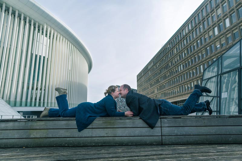 the photographer asked the fiancés to lay down