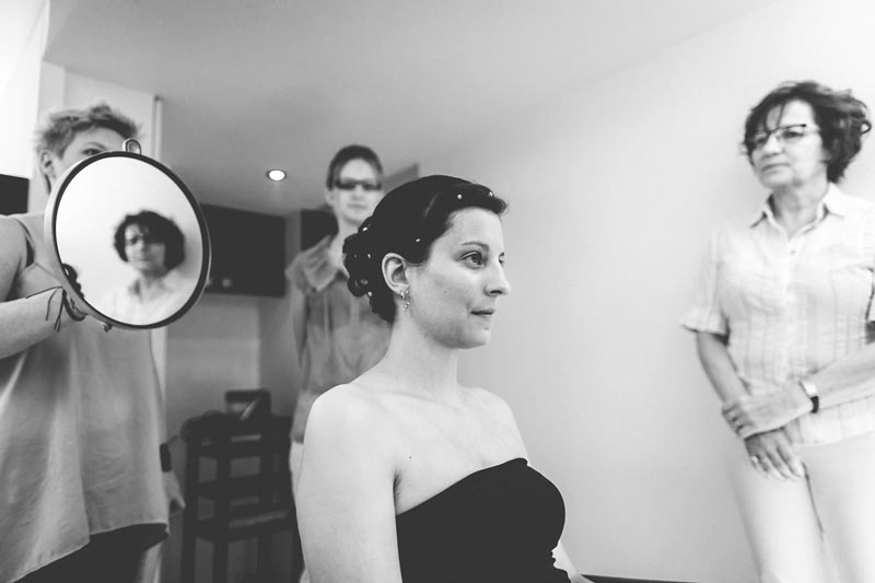 photographer shot the bride admiring herself in the mirror