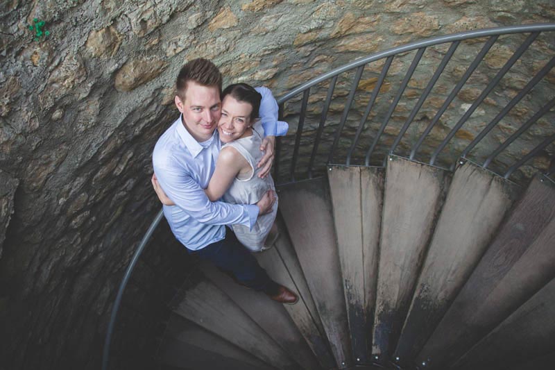 couple photographed in a staircase