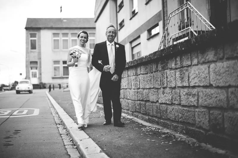 the bride walking with her dad