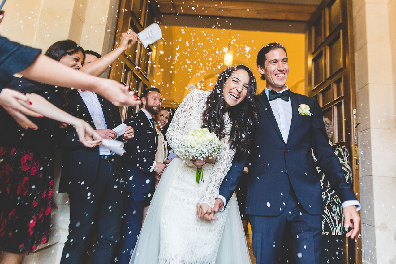 bride and groom coming out of limpersberg church 1