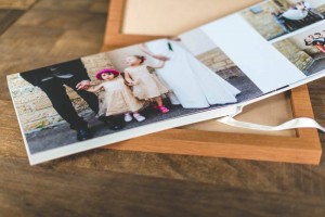 lay-flat photo album in its wooden case