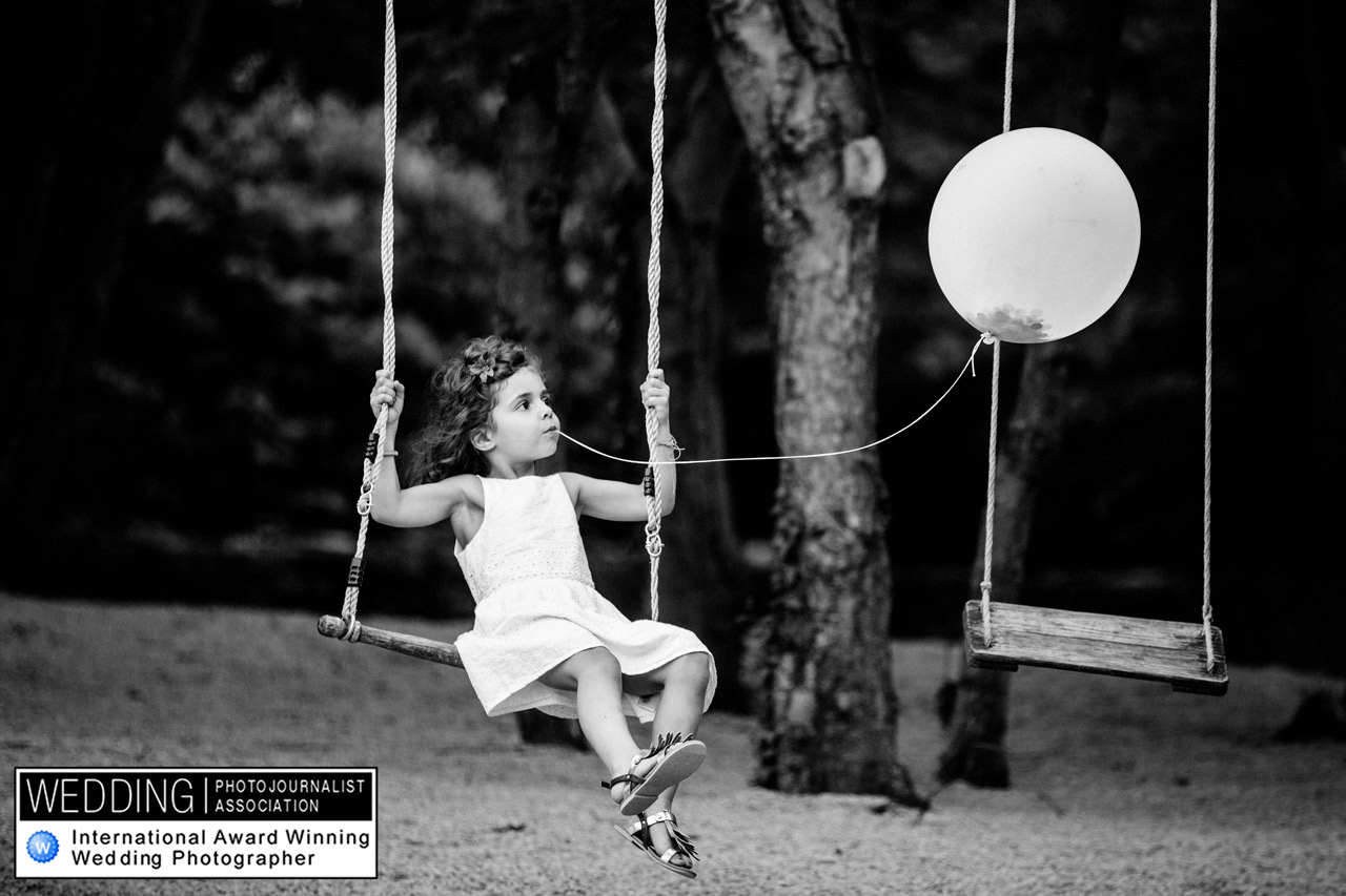 little girl on a swin