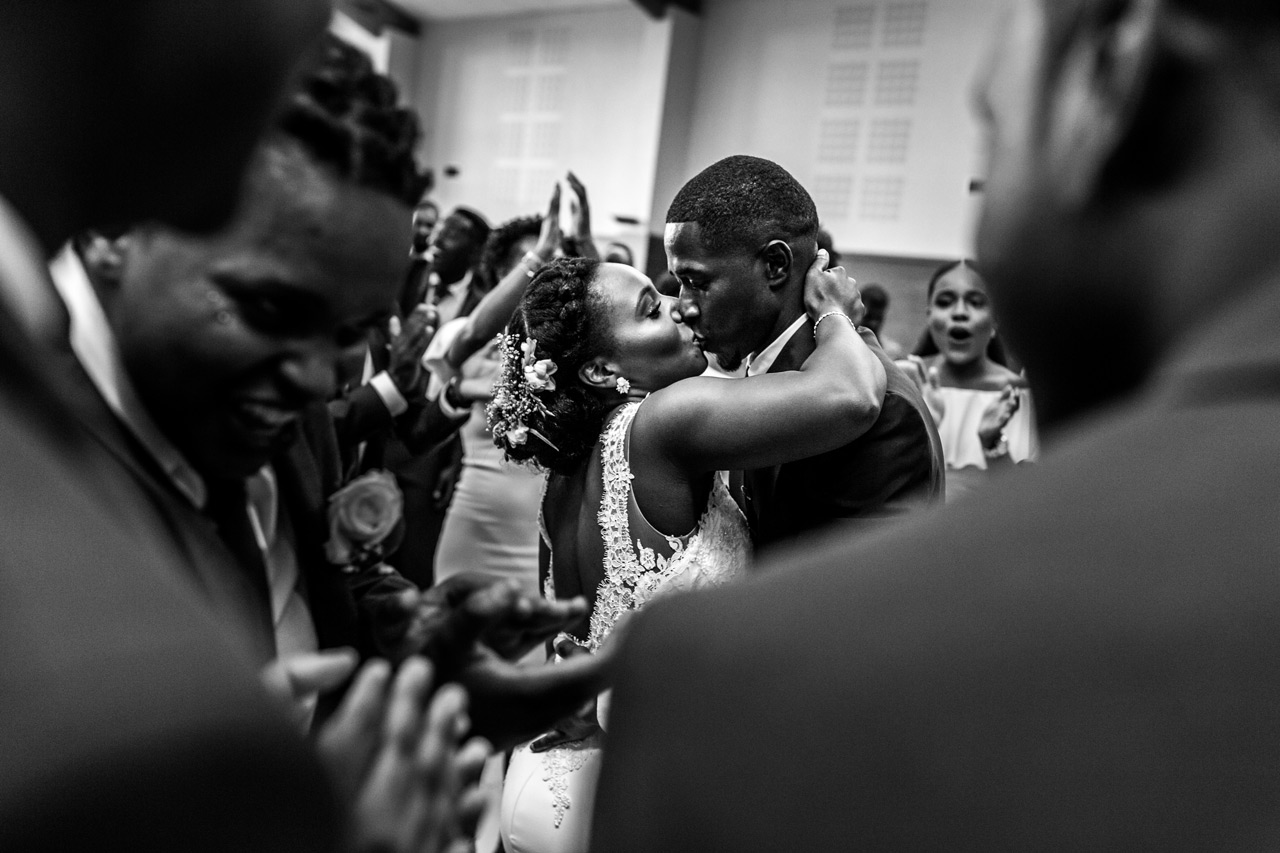 bride and groom dancing and kissing like crazy
